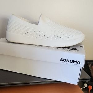 Women comfort knit white sneakers.